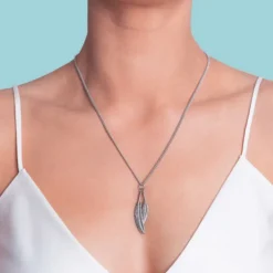 Boh Runga Duo Miromiro Feather Pendant | Silver
