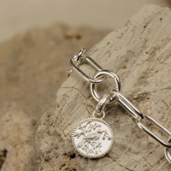 Evolve | Tui Coin | Silver | Pendant Charm